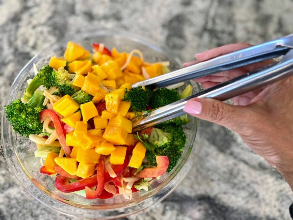 Add the vegetables mango salad