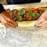 rolling the pizza pinwheels