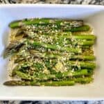 Preparing asparagus with parmesan