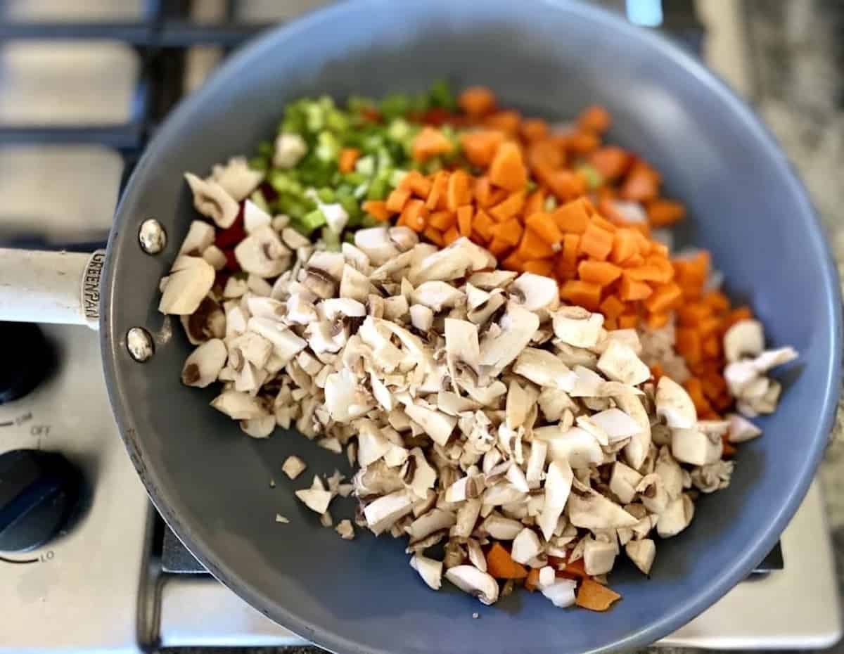 Add onions, carrots, celery and garlic to a saute pan on the stove