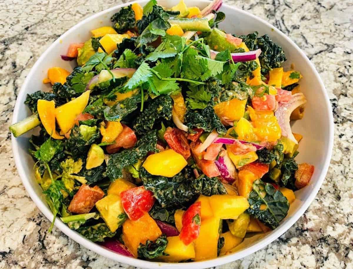 Kale salad served in a bowl on the counter
