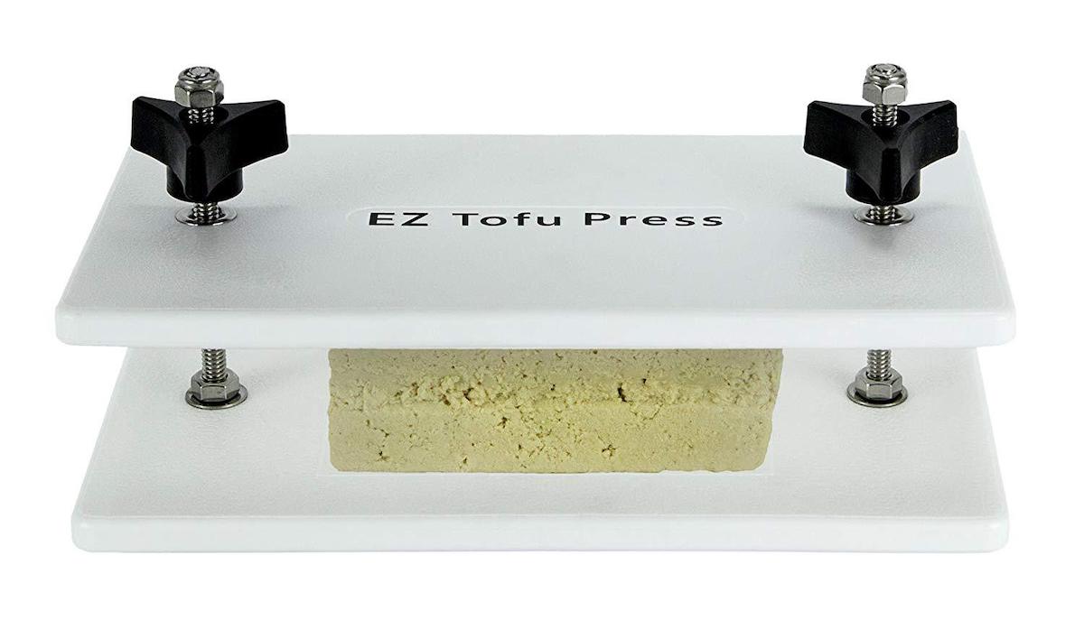 Tofu inside a tofu press