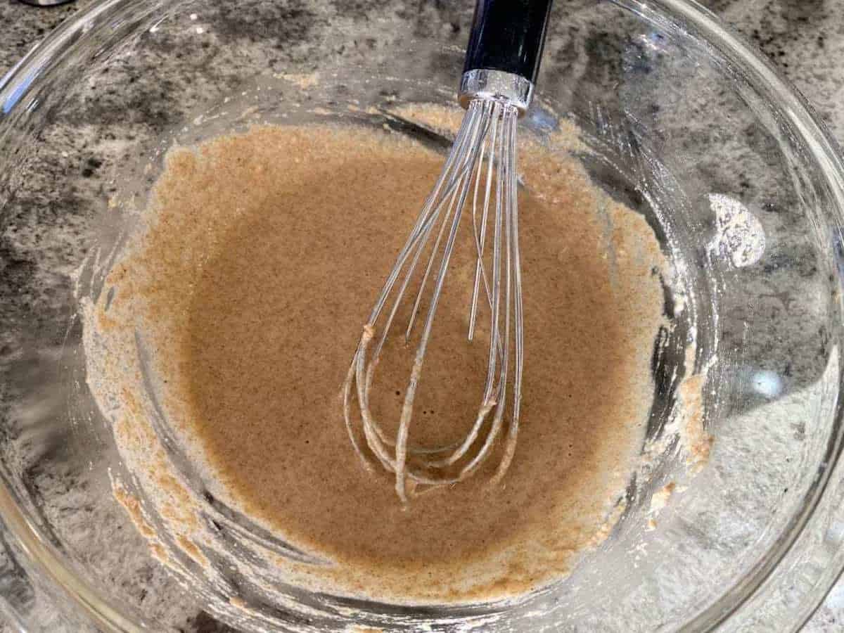 Whisk the flour in a bowl on the counter
