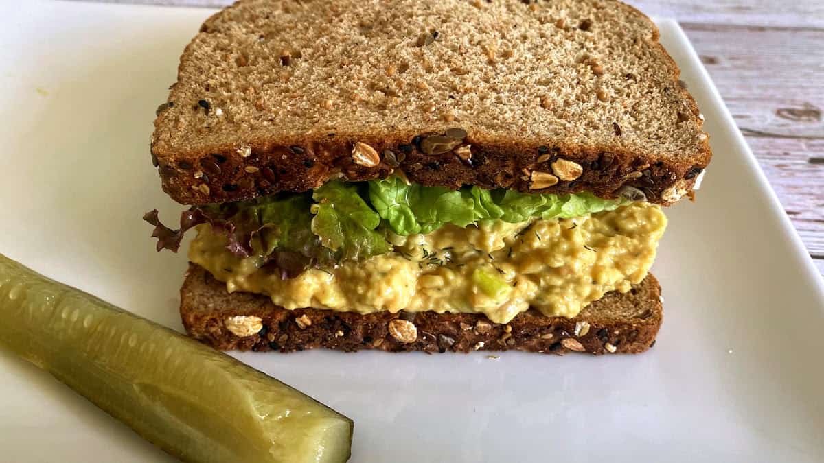 Sandwich on a plate with a pickle