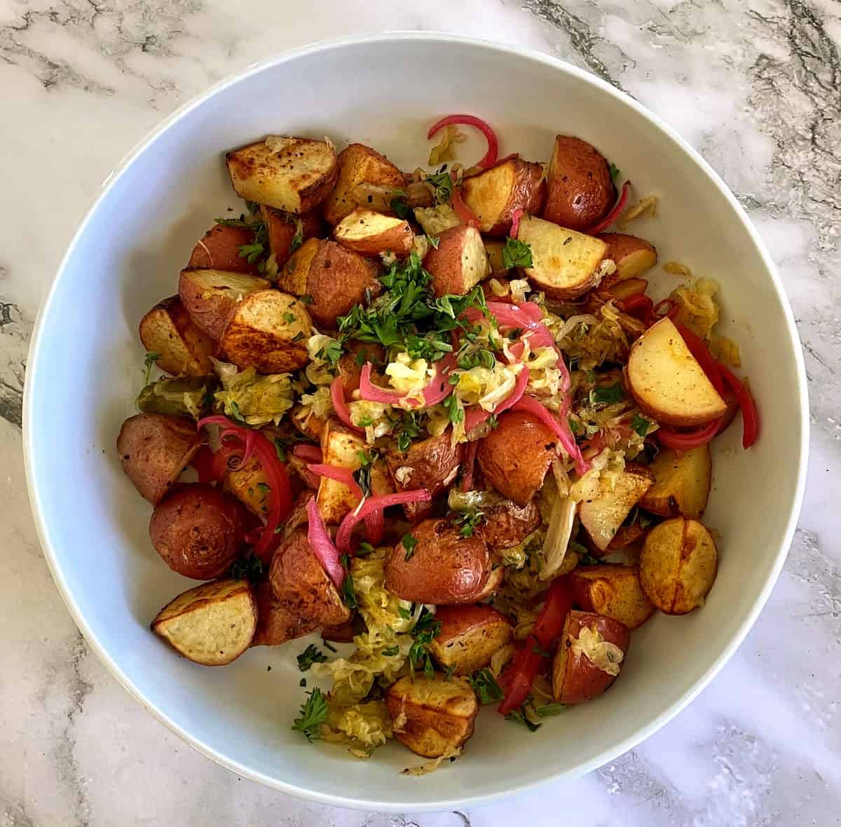 Irish roasted potato recipe in a bowl on the table. 