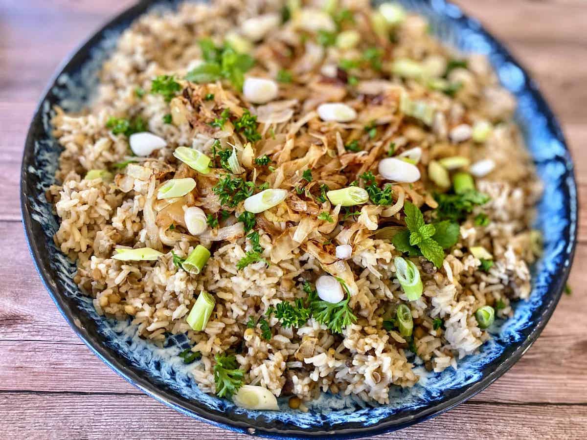 Mujaddara served on a platter on the table