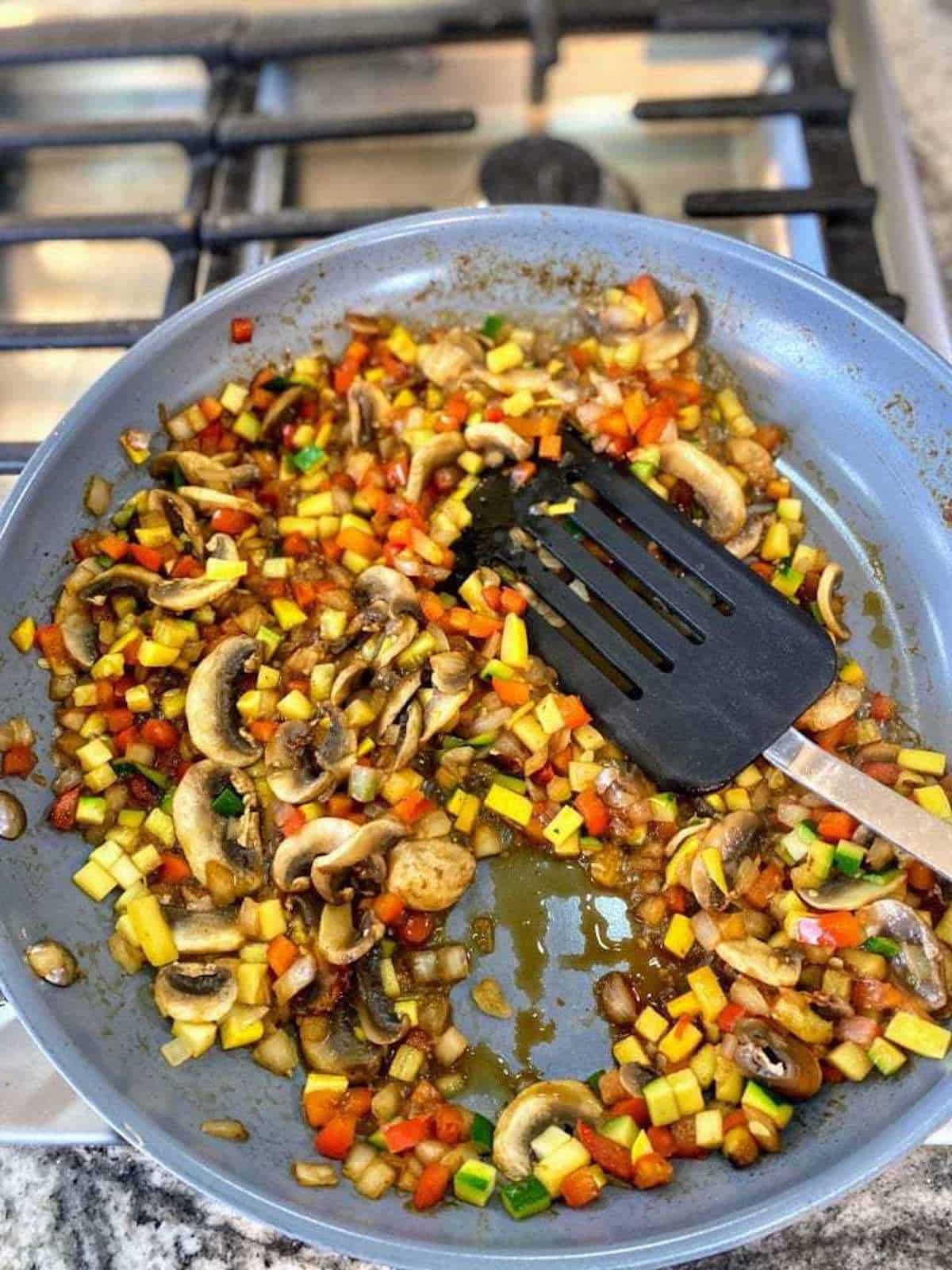 I sauteed the vegetables in a pan on the stove.