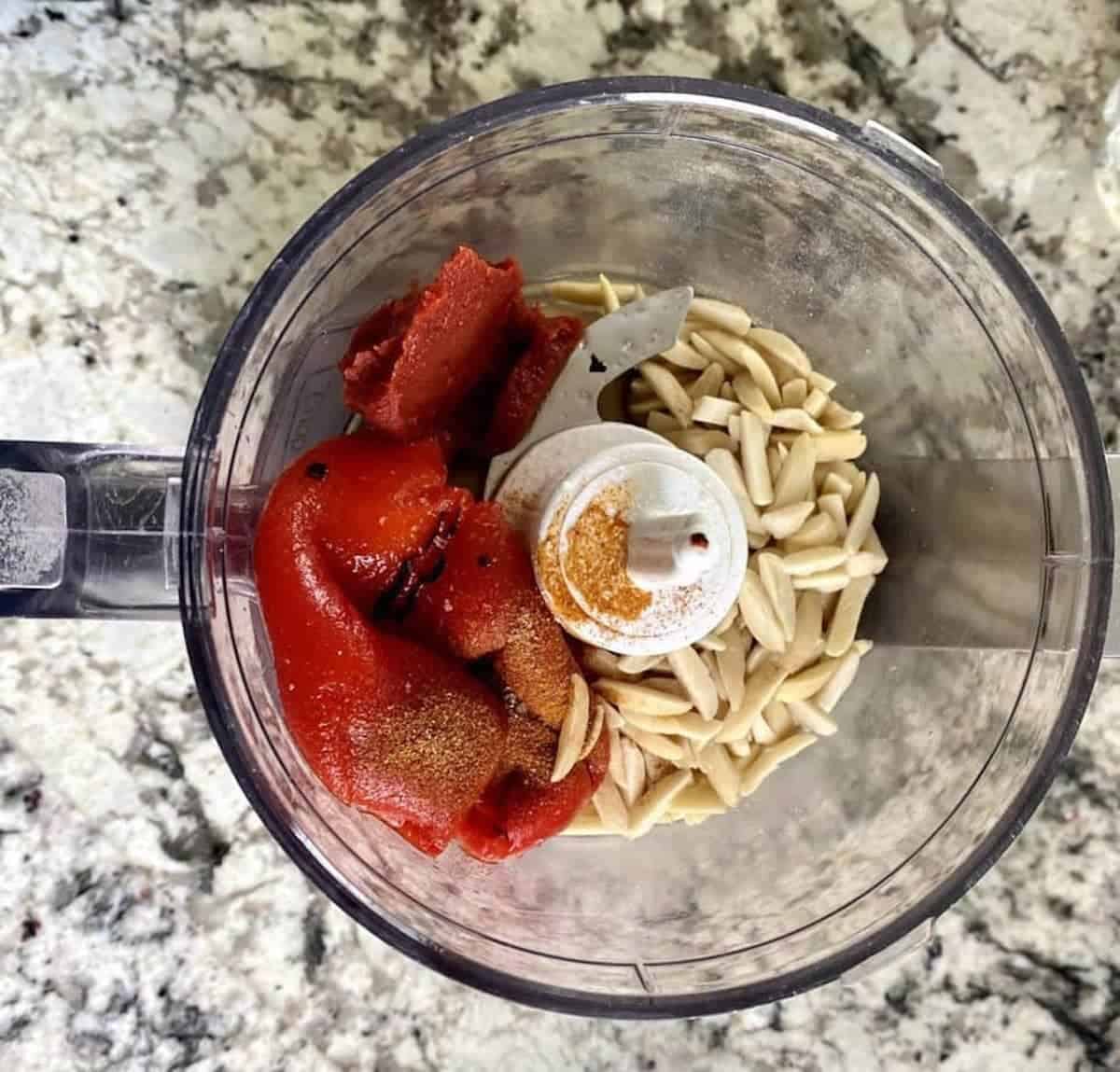 Sauce ingredients in a small food processor cup. 