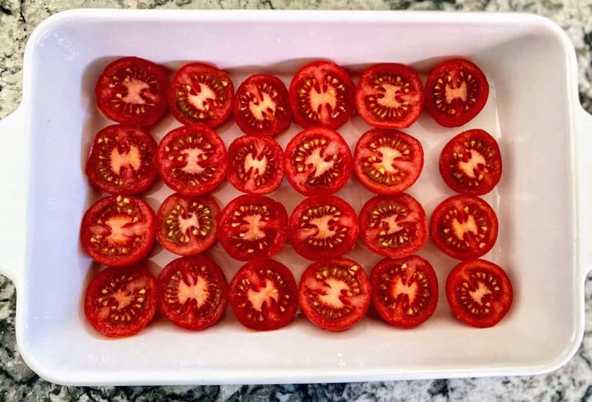 Cut tomatoes in a single layer in a casserole pan. 