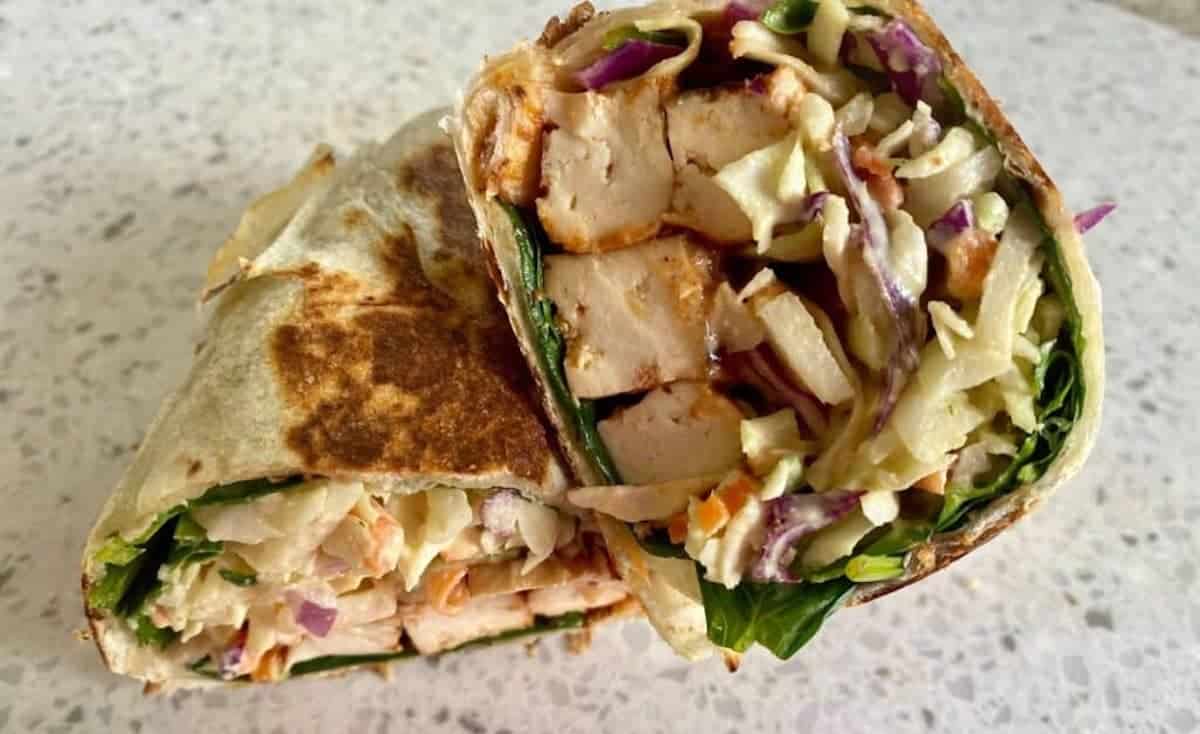 BBQ tofu wrap with creamy vegan coleslaw. 