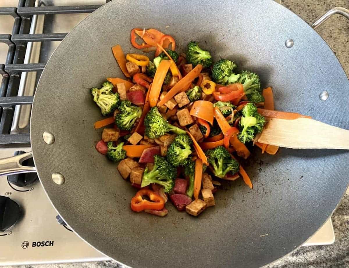 I am cooking the vegetables in a dry wok on the stove. 