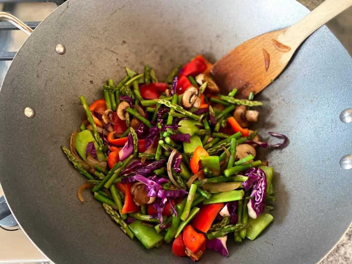 I am making Kung Pao Vegetables in a wok on the stove. 