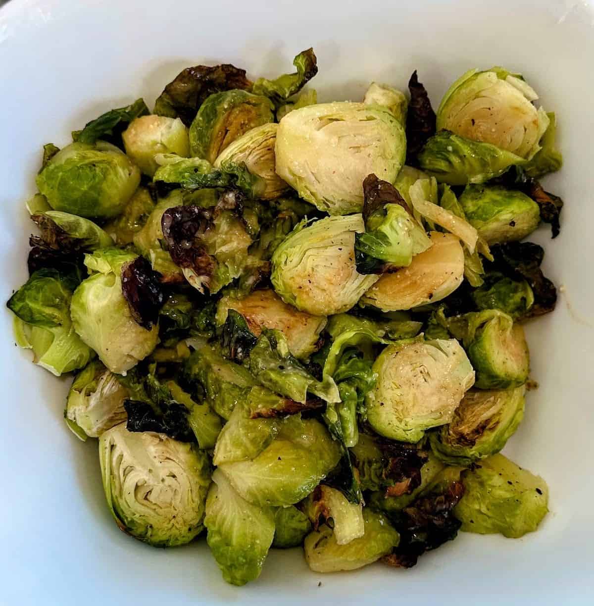 A bowl of miso maple Brussel sprouts.