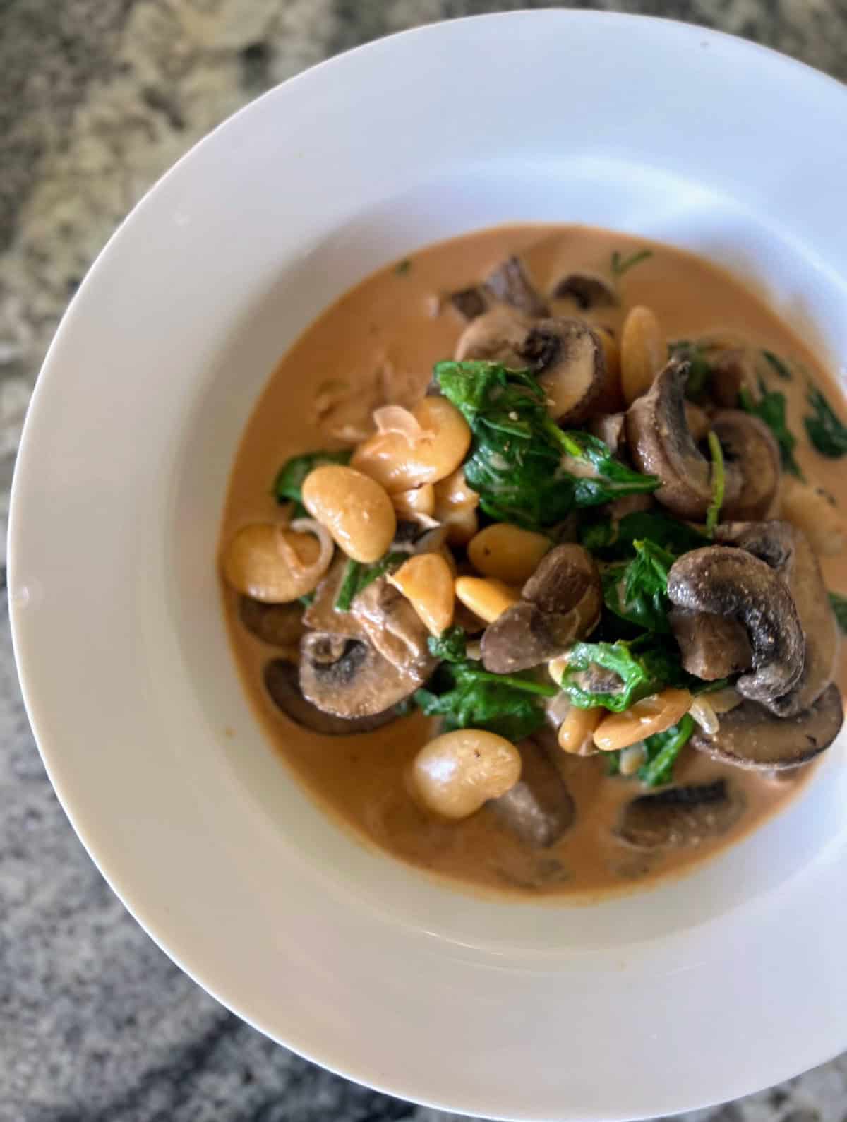 Butter bean curry in a bowl. 